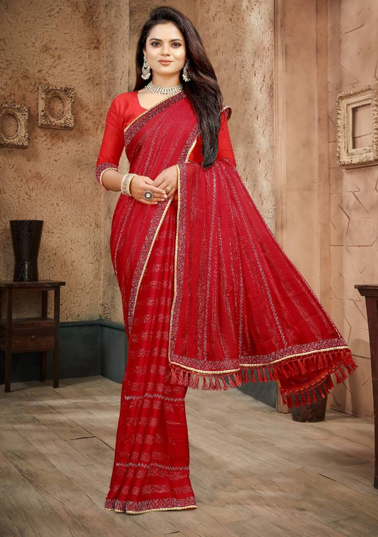 Red color siroski stone work rimzhim patta saree with  blouse