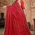 Red color siroski stone work rimzhim patta saree with  blouse