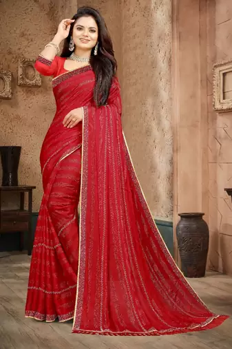 Red color siroski stone work rimzhim patta saree with  blouse