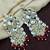 Aarnaa kundan pearl & red beads chandbali earrings jewellery for women