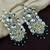 Aarnaa kundan pearl & green beads chandbali earrings wear jewellery for women