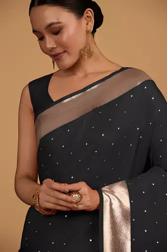 Black color banarasi silk blend saree with gold zari weaving work