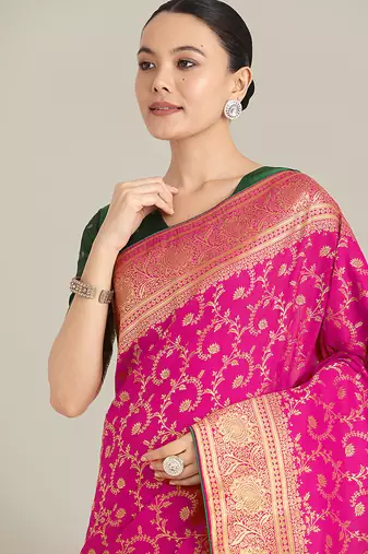 Rani Pink color banarasi silk blend saree with gold zari weaving work