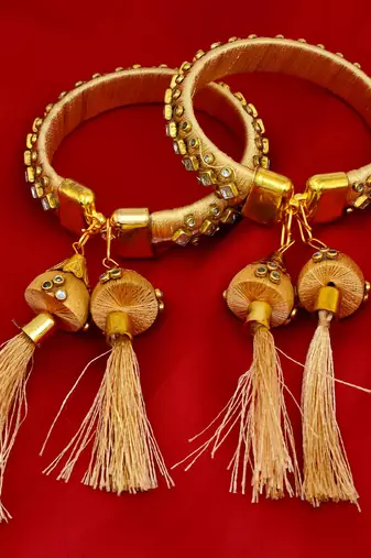 gold plated brass satin silk wrapped kundan hanging jhumki design bangle set