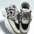 Black solid synthetic sneakers