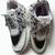 Black solid synthetic sneakers
