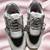 Black solid synthetic sneakers