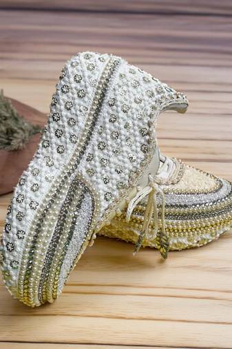 Ivory solid synthetic sneakers