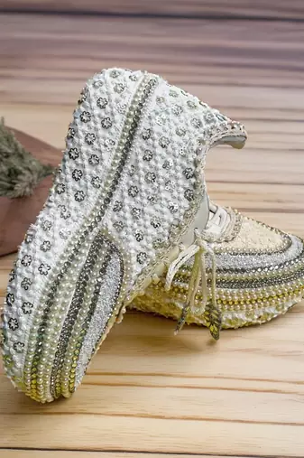 Ivory solid synthetic sneakers