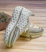 Ivory solid synthetic sneakers