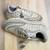 Ivory solid synthetic sneakers