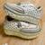 Ivory solid synthetic sneakers