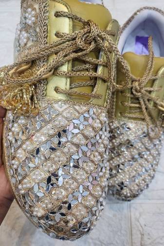 Golden solid synthetic sneakers
