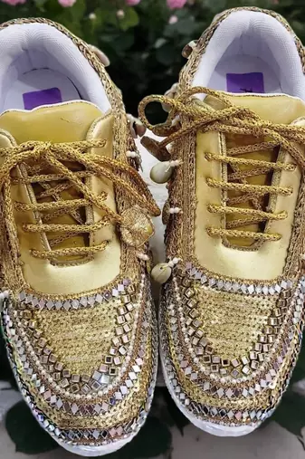 Golden solid synthetic sneakers