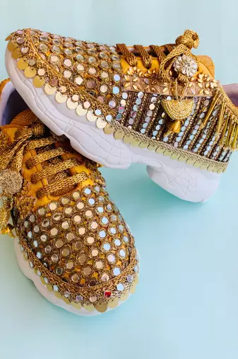 Golden solid synthetic sneakers