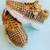 Golden solid synthetic sneakers