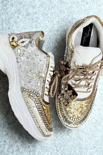 Golden solid synthetic sneakers