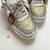 Golden solid synthetic sneakers