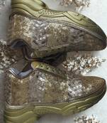 Golden solid synthetic sneakers