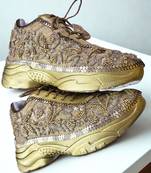 Golden solid synthetic sneakers