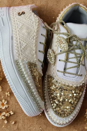 Ivory solid synthetic sneakers