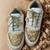 Ivory solid synthetic sneakers