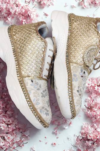 Ivory solid synthetic sneakers
