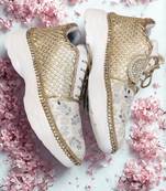 Ivory solid synthetic sneakers