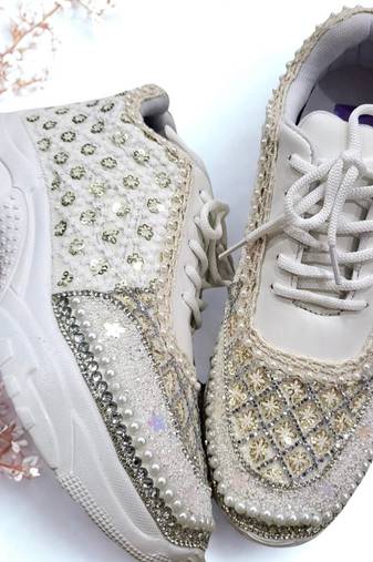 Ivory solid synthetic sneakers