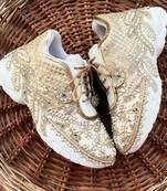 Golden solid synthetic sneakers