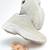 White solid synthetic sneakers