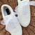 White solid synthetic sneakers