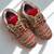 Red solid synthetic sneakers