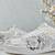 White solid synthetic sneakers