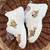 White solid synthetic sneakers