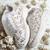 White solid synthetic sneakers
