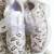 White solid synthetic sneakers