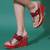 Red embroidered wedges shoes
