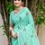 Sangam prints sea green linen woven work traditional saree