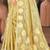 Sangam prints golden munga kota woven work traditional saree