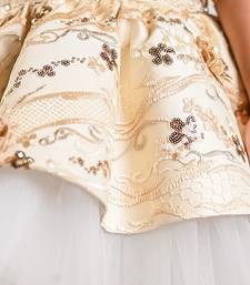 Beige embroidered net dress