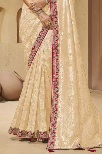 Cream color mirror and cord work jecquard saree with designer blouse fabric