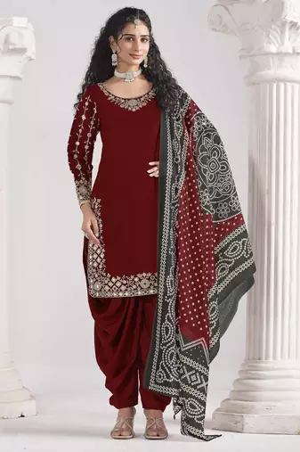 Maroon roman silk heavy thread embroidery, zari with mirror work salwar kameez