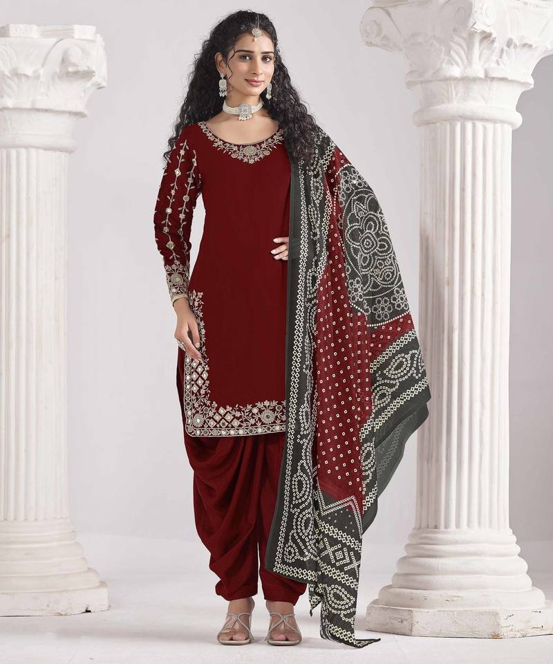 Maroon roman silk heavy thread embroidery, zari with mirror work salwar kameez