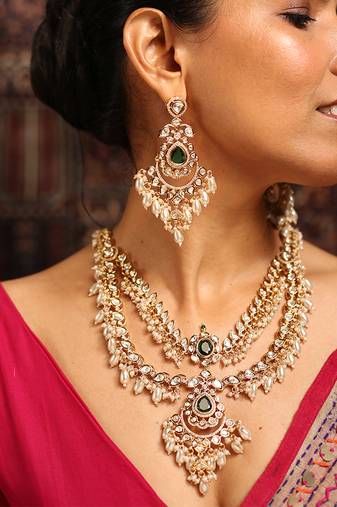 Layered kundan necklace set with green stone and pearl drops
