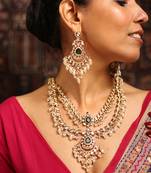 Layered kundan necklace set with green stone and pearl drops