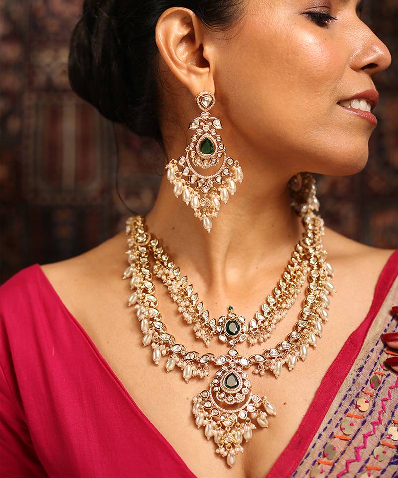 Layered kundan necklace set with green stone and pearl drops