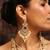 Layered kundan necklace set with green stone and pearl drops