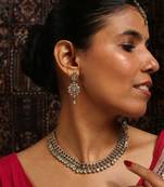 Delicate mint green and gold statement necklace set with matching earrings and tikka