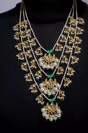 High gold multi-layer pearl and kundan necklace set with matching earrings